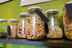 Nuts and seeds in jars photo