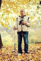 A senior man hiking photo