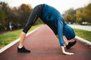 A woman doing physical exercises photo