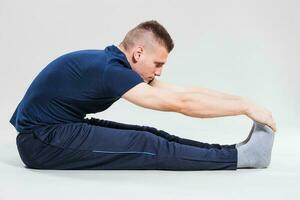 A man doing physical exercises photo