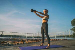 A woman doing physical exercises photo