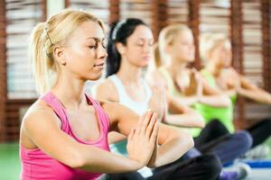 Women doing physical exercises photo