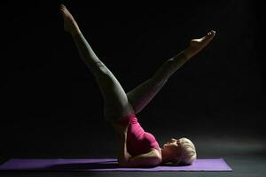 A woman doing physical exercises photo