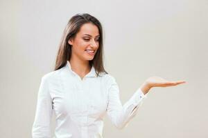 A woman in a white shirt photo