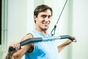 A man doing physical exercises photo