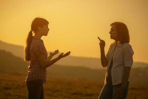 Grandmother and granddaughter spending time outdoors photo