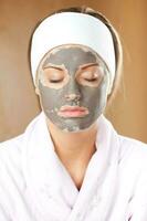 A woman having a facial treatment photo