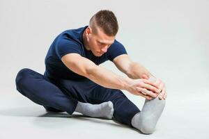 A man doing physical exercises photo