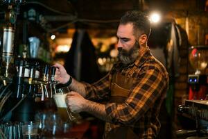 Portrait of a man who works as a bartender photo