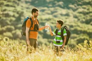 Father and son hiking photo