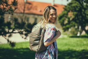 Young tourist woman on the park photo