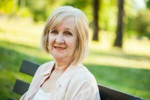 A senior woman in the park photo