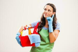 A woman who is going to clean the house photo