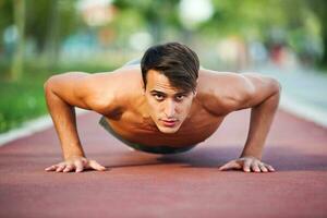 A man doing physical exercises photo