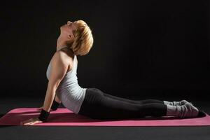 A woman doing exercises photo