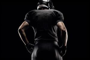 View from the back of american football player isolated on black background illustration photo