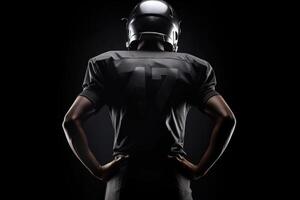 View from the back of american football player isolated on black background illustration photo