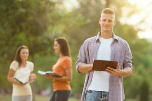 Friends spending time together outdoors photo