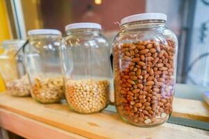 Nuts and seeds in jars photo