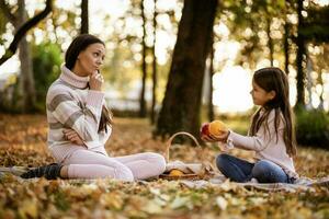 Mother and daughter spending time outdoors photo