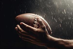 Under the rain detail of american football on player hands Sportsman in action. catching the ball illustration photo