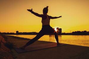 A woman doing physical exercises photo