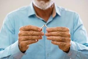 Senior man is decided to quit smoking photo