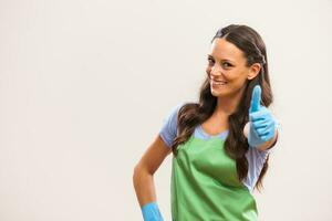 A woman who is going to clean the house photo