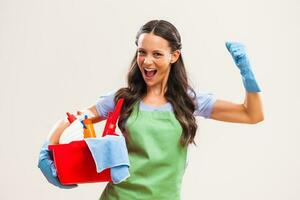 A woman who is going to clean the house photo