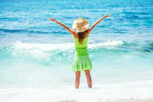 Woman standing in the sea photo