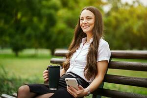 A businesswoman using her phone photo