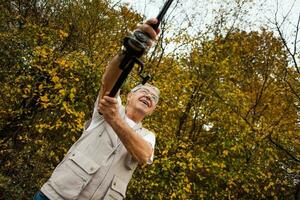 A senior man fishing photo