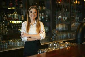 Portrait of a woman who works as a bartender photo
