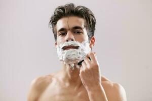 A man shaving photo