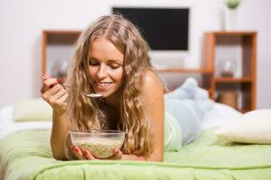 A woman in her bedroom photo