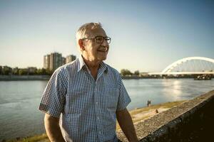 Portrait of a senior man outdoors photo