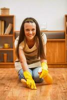 A woman cleaning the house photo