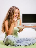 A woman in her bedroom photo