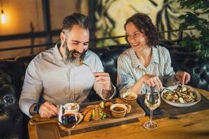 A couple having dinner photo