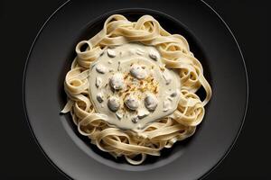 Fetuccini Alfredo Pasta plate view from the top isolated on black background illustration photo