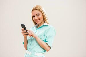 Portrait of a nurse with phone photo