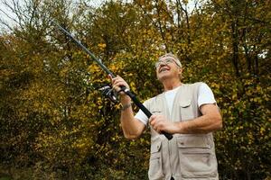 A senior man fishing photo