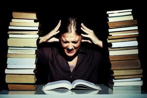 Portrait of a stressed woman with books photo