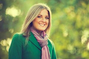 A happy woman in the park photo