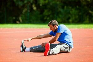 A man doing physical exercises photo