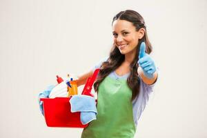 A woman who is going to clean the house photo