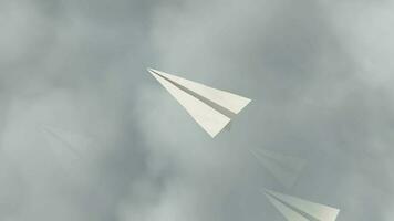 Paper plane flying high in the clouds video