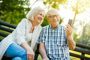 A senior couple spending time together in the park photo