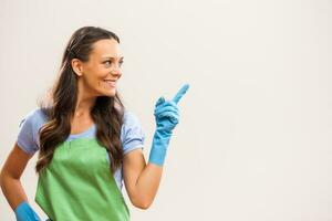 A woman ready to start cleaning photo