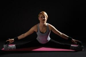 A woman doing exercises photo